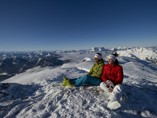 Skifahren in Fieberbrunn – Skifahrer auf Gipfel